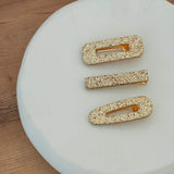 Barrettes à paillettes dorée